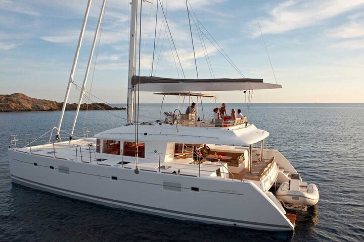 Santorini Catamaran Cruise with Swim-Stops, Greek Meal and Sunset