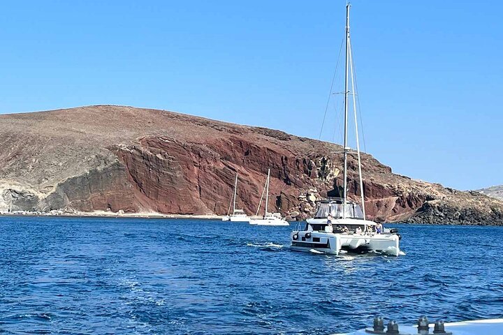 Santorini Catamaran Cruise with Swim-Stops, Greek Meal and Sunset