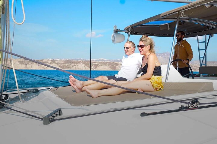 Santorini Catamaran Cruise with Swim-Stops, Greek Meal and Sunset
