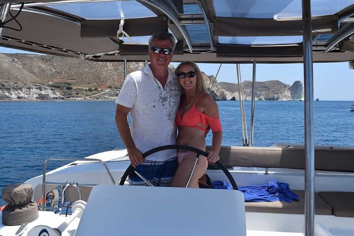 Santorini Catamaran Cruise with Swim-Stops, Greek Meal and Sunset