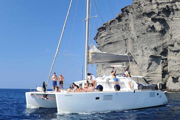Santorini Catamaran Cruise with Swim-Stops, Greek Meal and Sunset