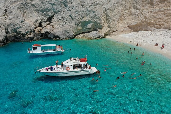 Zakynthos boat tour:Shipwreck& Local blue caves with 3 Swim Stops