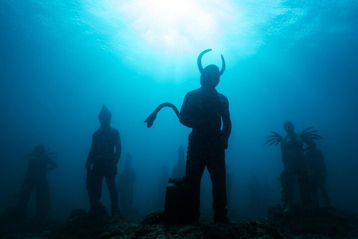 4-hour snorkel cruise to Underwater Sculptures with boat dogs