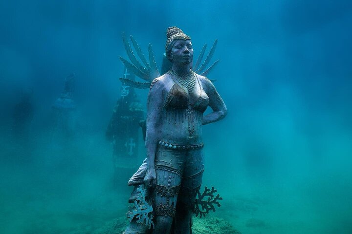 4-hour snorkel cruise to Underwater Sculptures with boat dogs