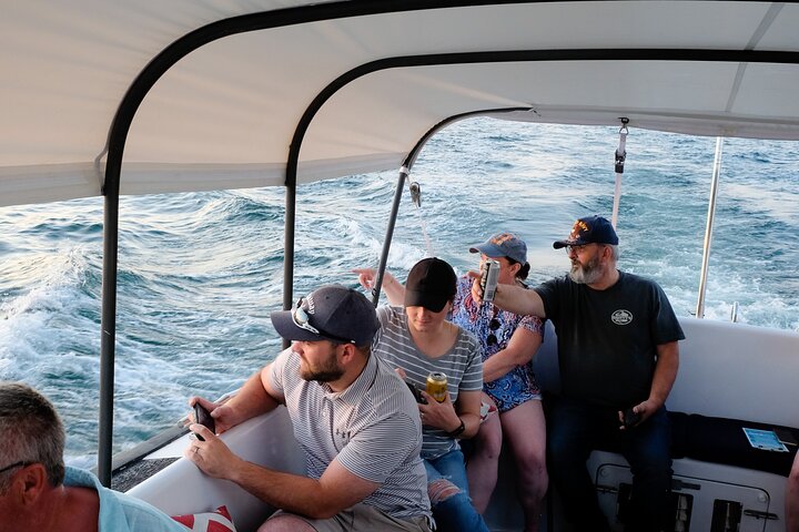 Small Group Sunset Lighthouse Boat Cruise With Local Drinks