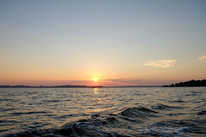 Small Group Sunset Lighthouse Boat Cruise With Local Drinks