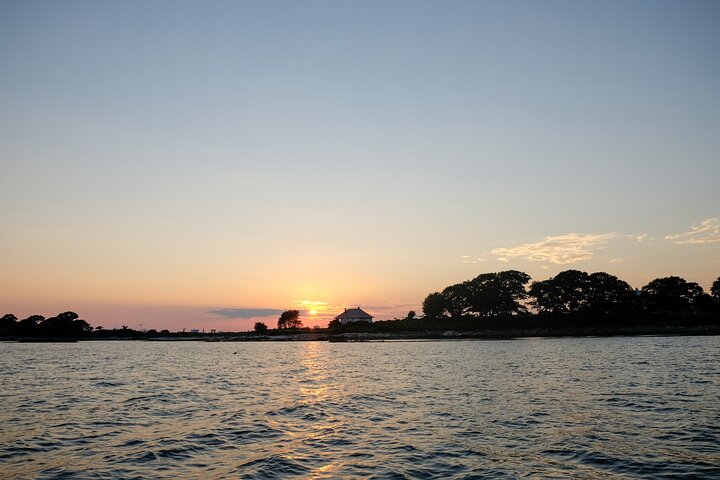 Small Group Sunset Lighthouse Boat Cruise With Local Drinks
