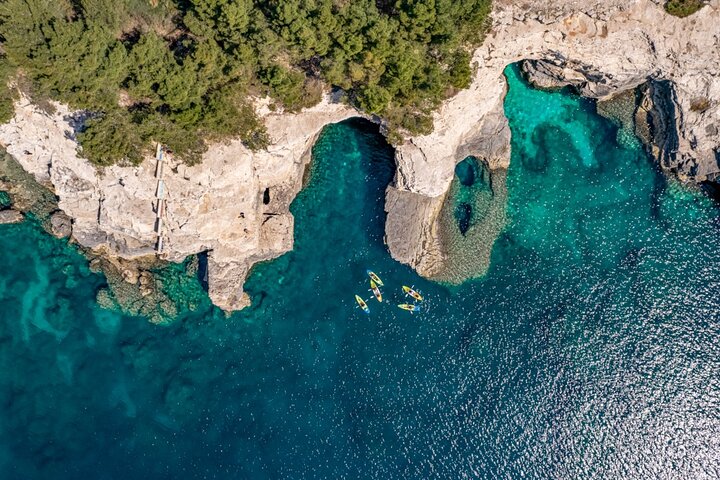 Pula: Sea Cave Kayak Tour with Snorkeling & Cliff Jumping
