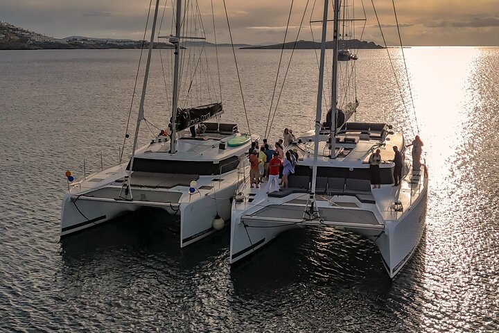 Mykonos: Brand-New Catamaran Cruise with Meal, Drinks & Transport