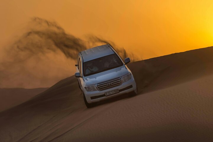VIP Desert Safari Camel Ride Sand Boarding & BBQ Dinner