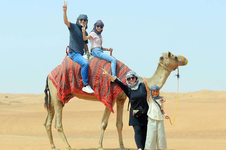 VIP Desert Safari Camel Ride Sand Boarding & BBQ Dinner
