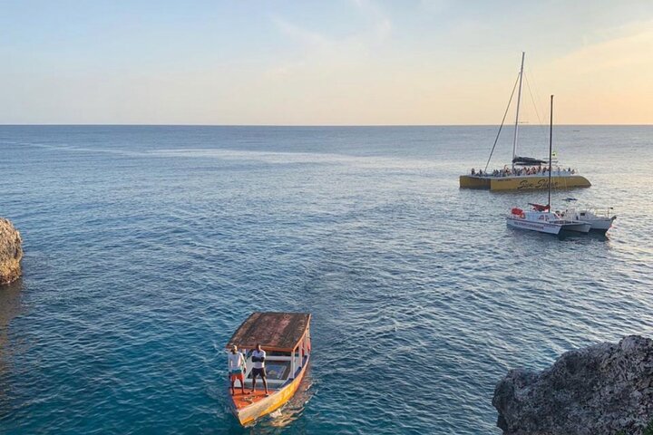 Bamboo Rafting, Catamaran Party Cruise and Ricks Cafe
