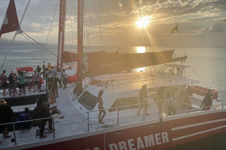 Bamboo Rafting, Catamaran Party Cruise and Ricks Cafe