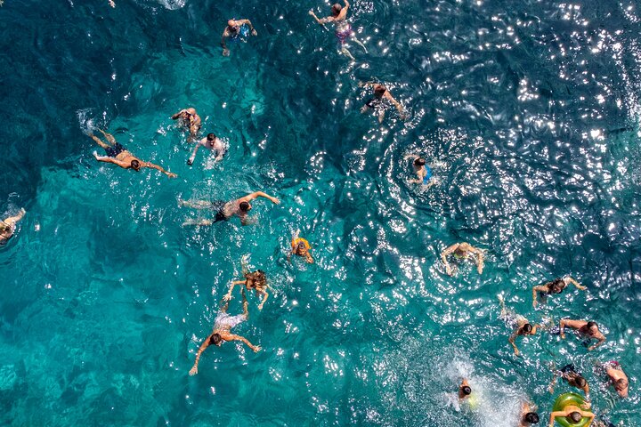 3 Island Luxury Cruise with 4 Swimming Stops with Captain Morgan
