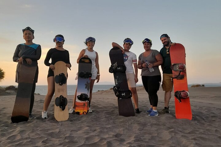 Sandboarding in the Mogote Sand Dunes in La Paz