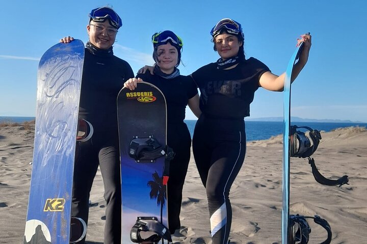 Sandboarding in the Mogote Sand Dunes in La Paz