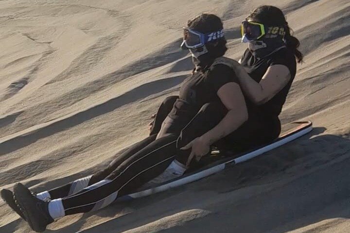 Sandboarding in the Mogote Sand Dunes in La Paz