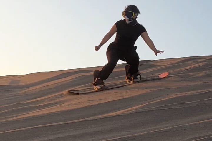Sandboarding in the Mogote Sand Dunes in La Paz