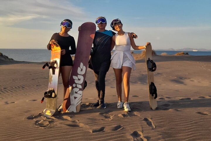 Sandboarding in the Mogote Sand Dunes in La Paz