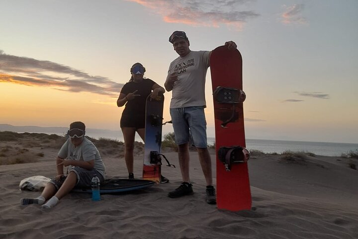 Sandboarding in the Mogote Sand Dunes in La Paz