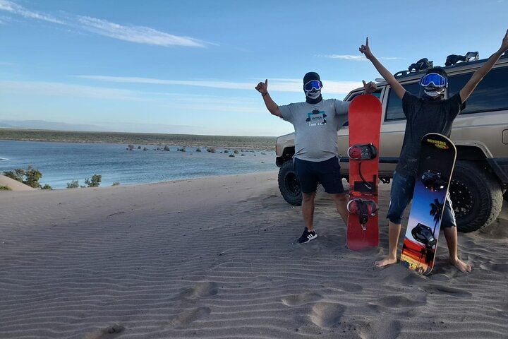 Sandboarding in the Mogote Sand Dunes in La Paz
