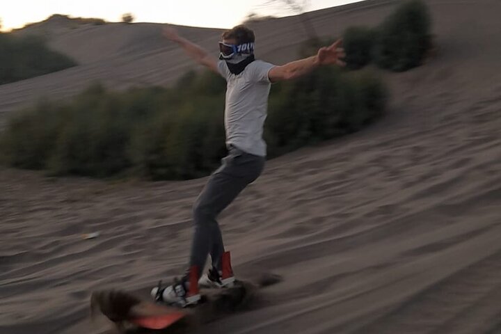 Sandboarding in the Mogote Sand Dunes in La Paz