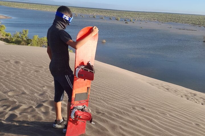 Sandboarding in the Mogote Sand Dunes in La Paz