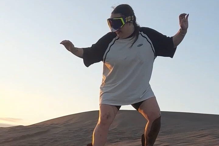 Sandboarding in the Mogote Sand Dunes in La Paz