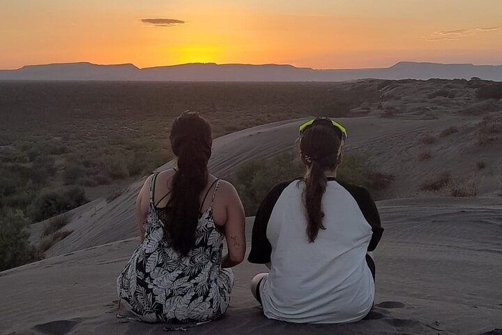 Sandboarding in the Mogote Sand Dunes in La Paz