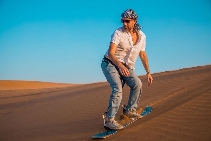 Abu Dhabi: Desert Safari with BBQ, Camel Ride & Sandboarding