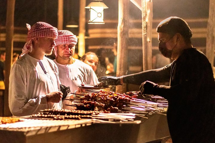 Abu Dhabi: Desert Safari with BBQ, Camel Ride & Sandboarding