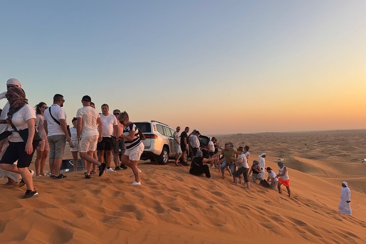Dubai: VIP Sunset Red Dune Safari, Camel Ride & BBQ Dinner