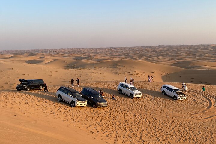 Dubai: VIP Sunset Red Dune Safari, Camel Ride & BBQ Dinner