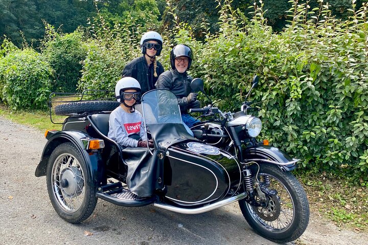 Saint Malo and Saint Servan in vintage sidecar with driver