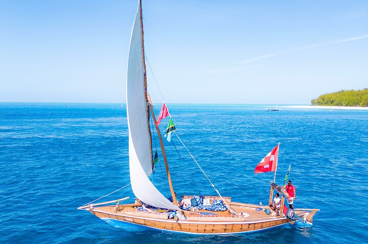 Exclusive private full-day Dhow sail & snorkel Mnemba sandbank