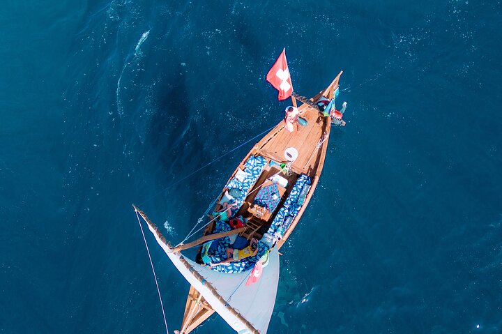 Exclusive private full-day Dhow sail & snorkel Mnemba sandbank
