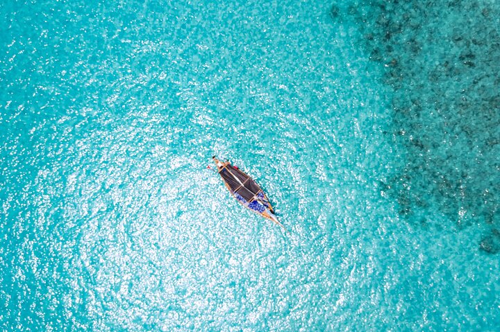 Exclusive private full-day Dhow sail & snorkel Mnemba sandbank