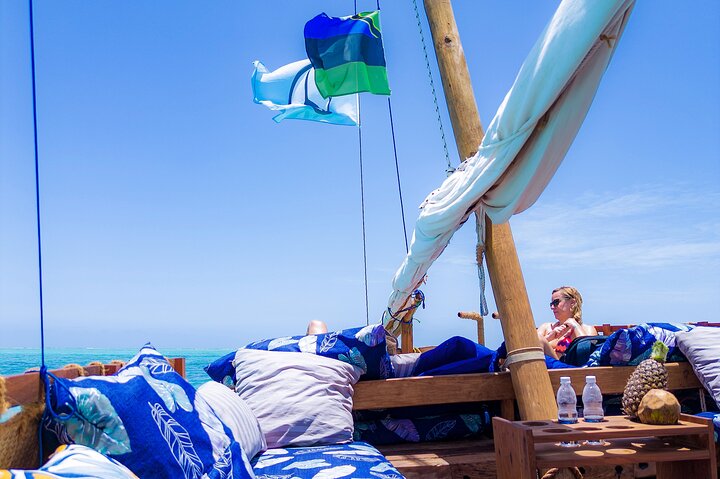 Exclusive private full-day Dhow sail & snorkel Mnemba sandbank