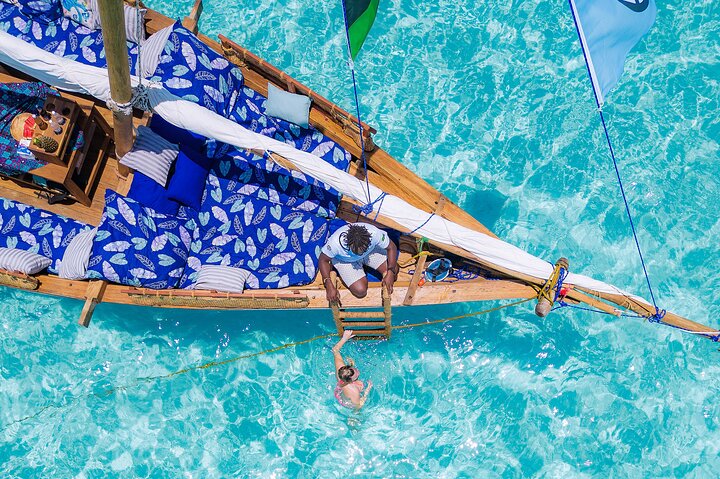 Exclusive private full-day Dhow sail & snorkel Mnemba sandbank