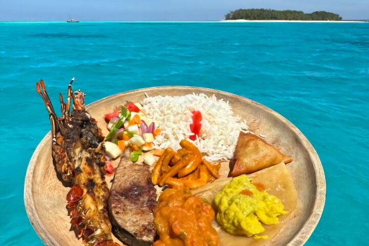 Exclusive private full-day Dhow sail & snorkel Mnemba sandbank