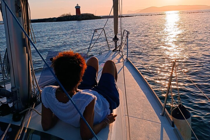 Sunset aperitif on a sailing boat in Alghero