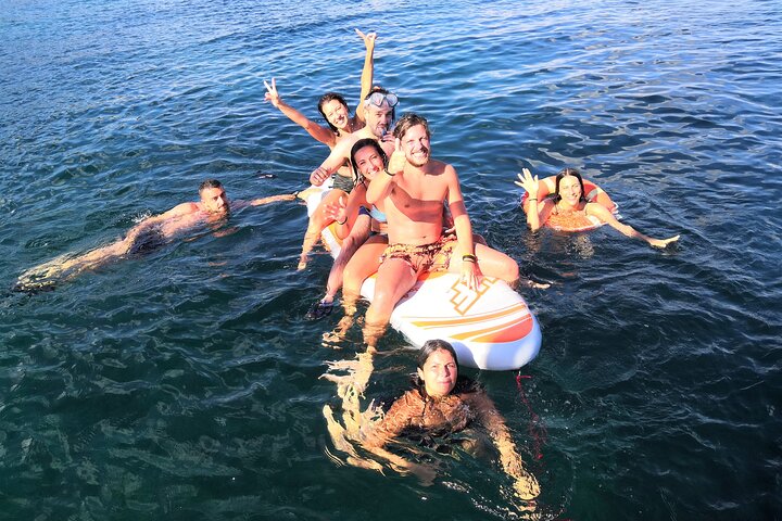 Sunset aperitif on a sailing boat in Alghero