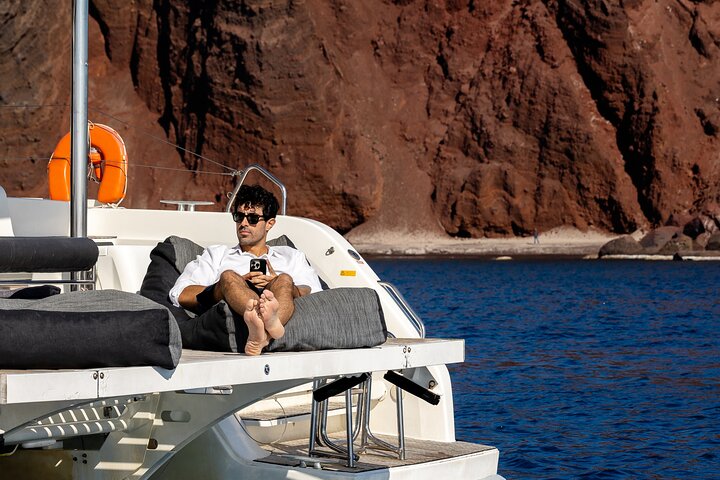 Half-Day Exclusive Catamaran Cruise in Santorini with Meal and Open Bar