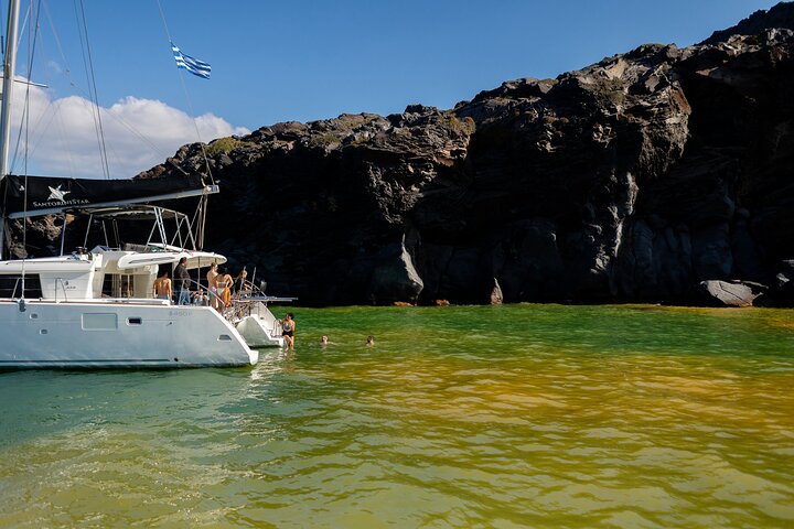 Half-Day Exclusive Catamaran Cruise in Santorini with Meal and Open Bar