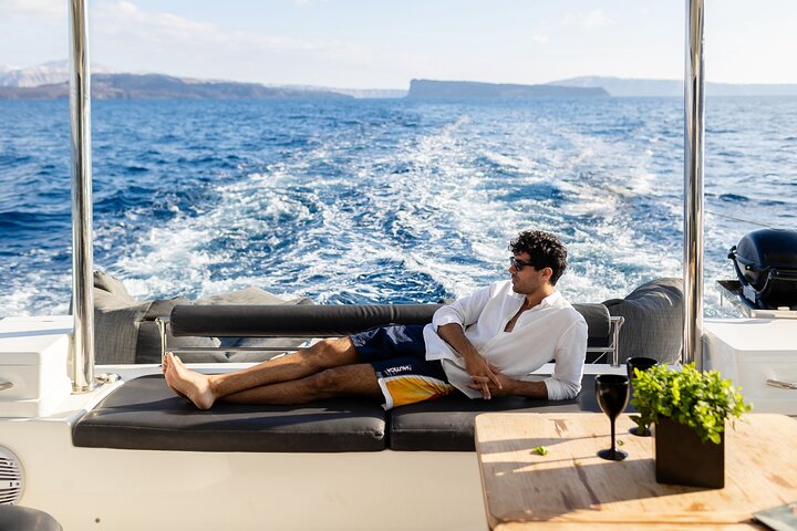 Half-Day Exclusive Catamaran Cruise in Santorini with Meal and Open Bar