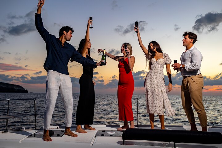Half-Day Exclusive Catamaran Cruise in Santorini with Meal and Open Bar