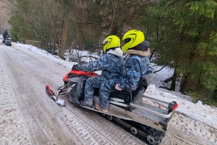 Day Tour from Bucharest-Carpathian Snowmobile Experience