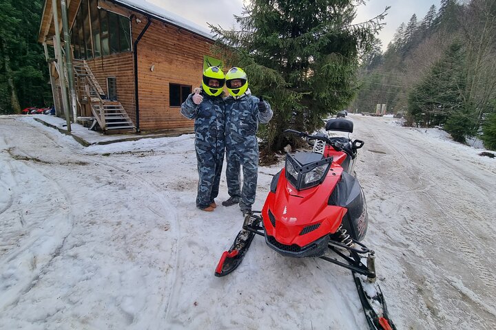 Day Tour from Bucharest-Carpathian Snowmobile Experience