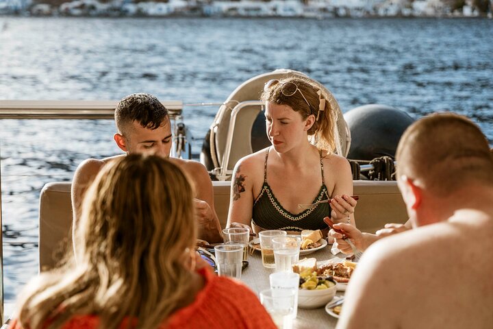 Santorini Catamaran Cruise with Swim-Stops, Greek Meal and Sunset