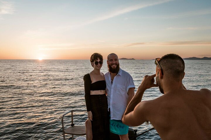 Santorini Catamaran Cruise with Swim-Stops, Greek Meal and Sunset